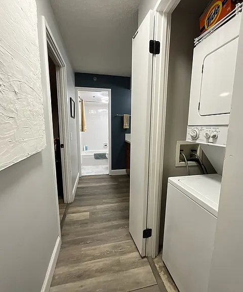 laundry closet in hallway
bedroom to the left
large vanity sink to the right
