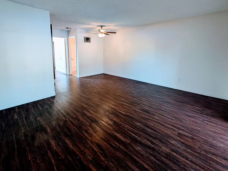 Living/dining room, sliding door & patio to your right).