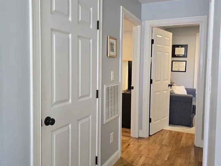 Wood floors and deisgner paint throughout.