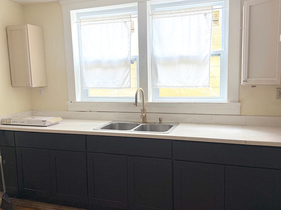 Kitchen-brand new lower cabinets, countertop and floor