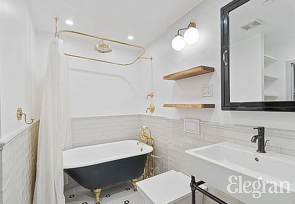 5th image of 214 E 9th St APT 2B