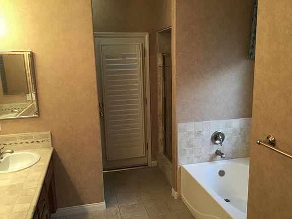 Master bath with separate tub and shower