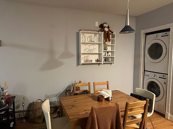 Dinning area and laundry with furnishings. (bottom floor)