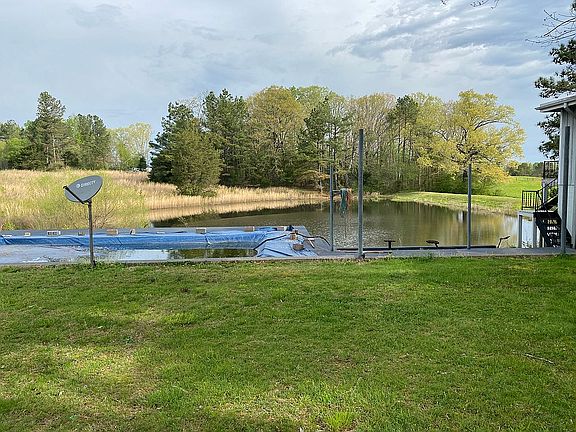 Pool over looking pond
