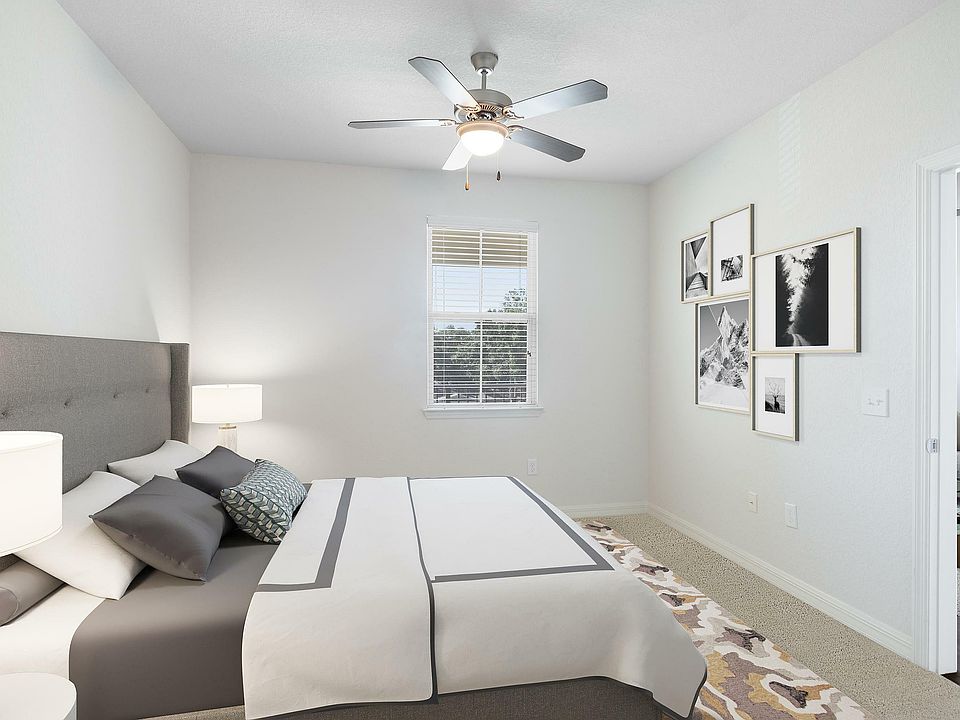 Relax in this elegant bedroom retreat, where modern style meets cozy comfort.