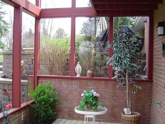 2 story sunroom merges the inside and outside