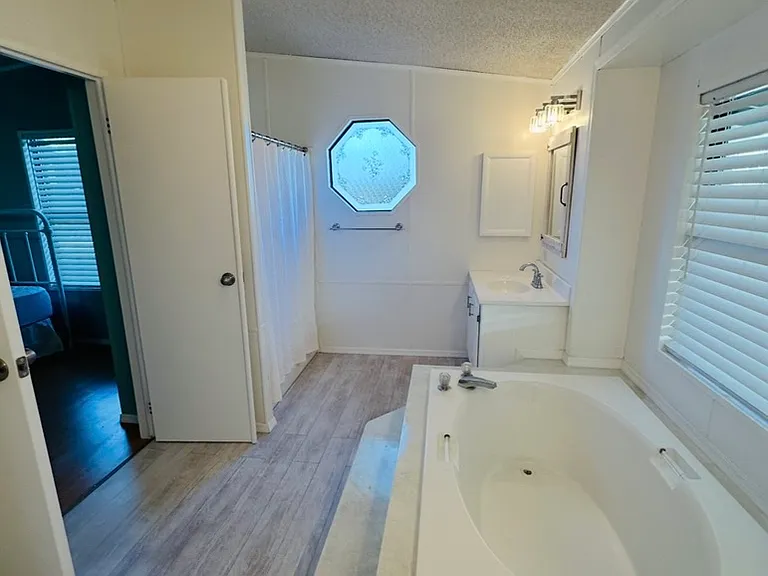 Master bath. Newly painted with updated flooring.