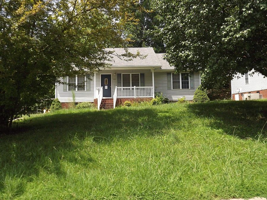 1st image of 203 Woodlea Hollow Ln