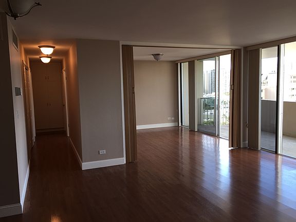 Living Room & Hallway leading to Laundry Area, Guest Bedroom