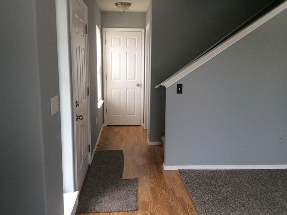 Main entry and guest bathroom entry