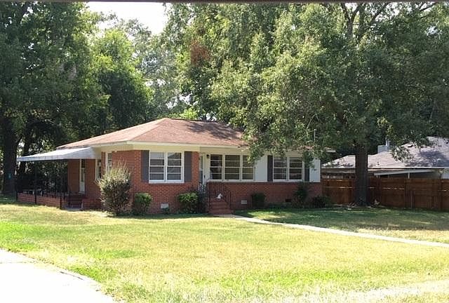 spacious front yard offset from road