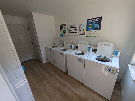 The laundry has four new washers operated with bank or credit cards. Also four new dryers on the left.