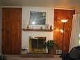 Living room with f/p
