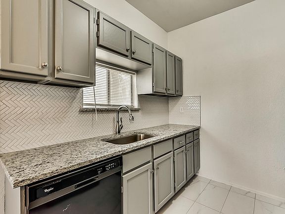 kitchen updates: granite, dishwasher, huge sink and new fixtures, tile backsplash and new tile floors