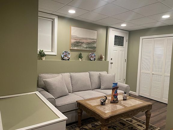 Cozy living room in the basement, to be shared by both tenants.