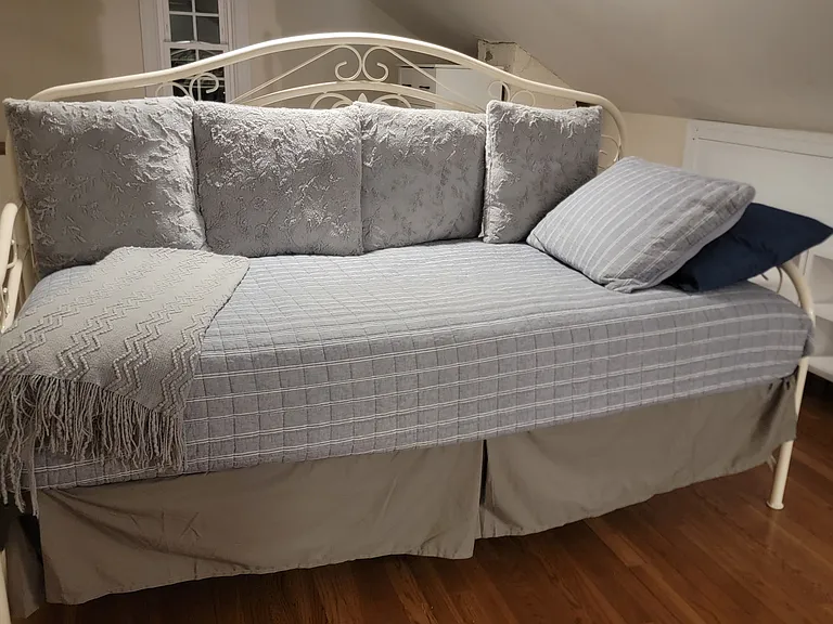 Upstairs third bedroom with two single beds