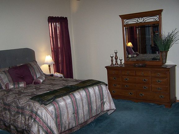 master bedroom with an office