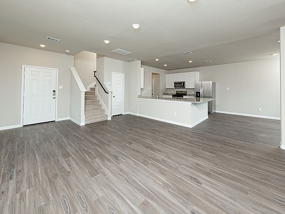 Family Room to Kitchen and Dining Area