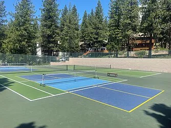 HOA tennis and pickle ball courts open during summer months.