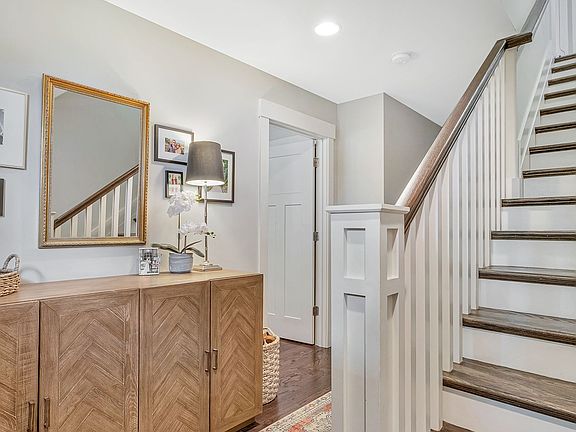 Entry way from front door. First bedroom to the left. Entry to garage down the hall.