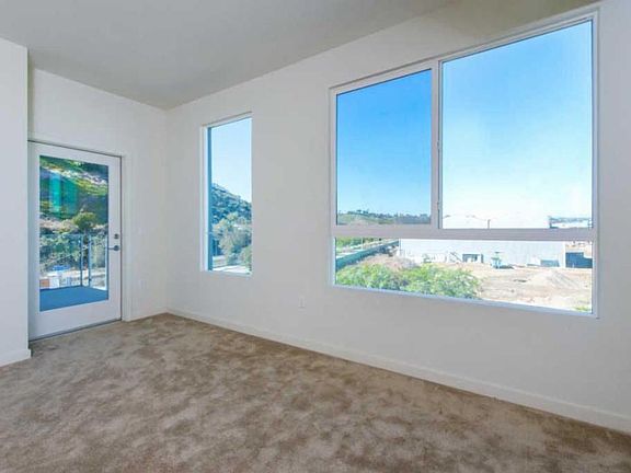 Large windows in the living room create tons of natural light.