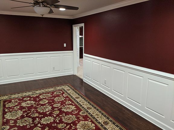 Formal Living Room with custom Wainscoting.