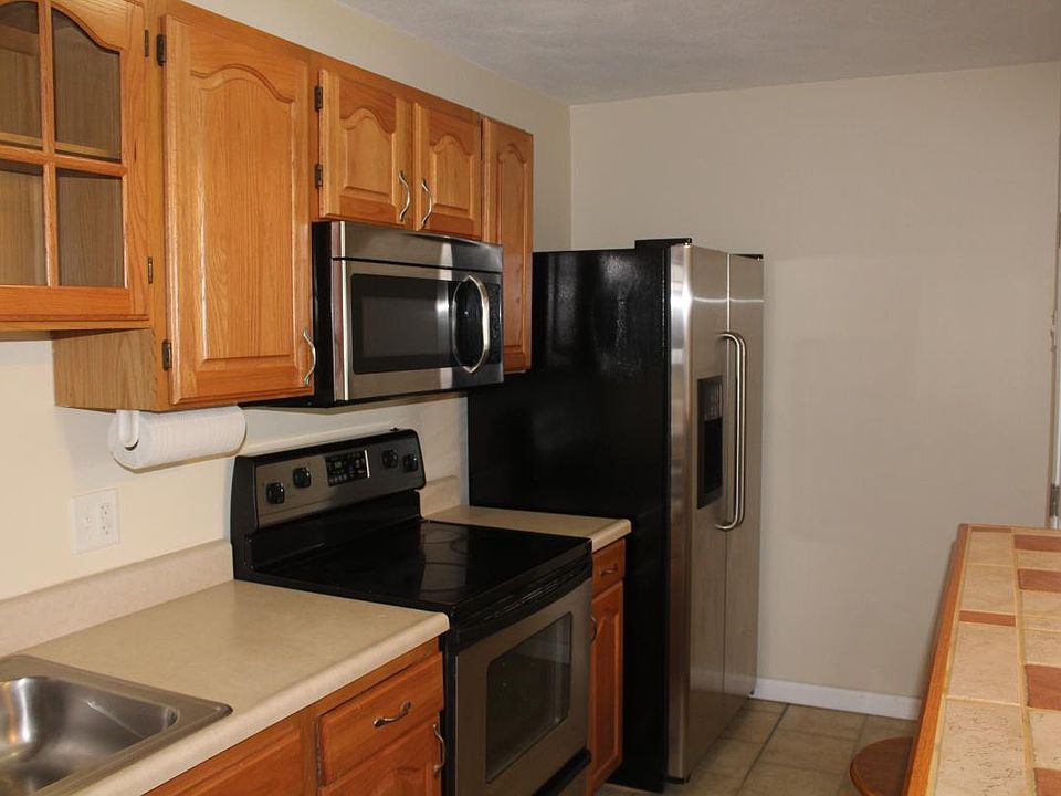 Kitchen has stainless steel appliances and dishwasher