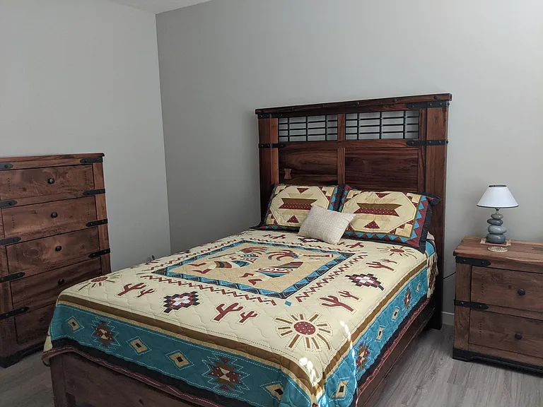 Spare bedroom with walk-in closet