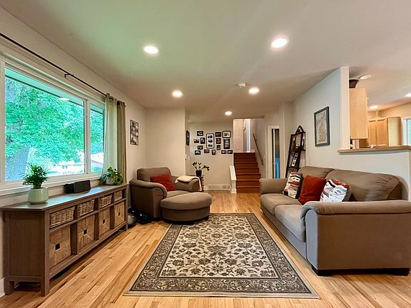 Living room. Large, west-facing front window.