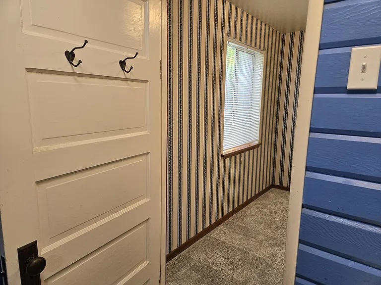 Looking into Back Bedroom from Powder Room.