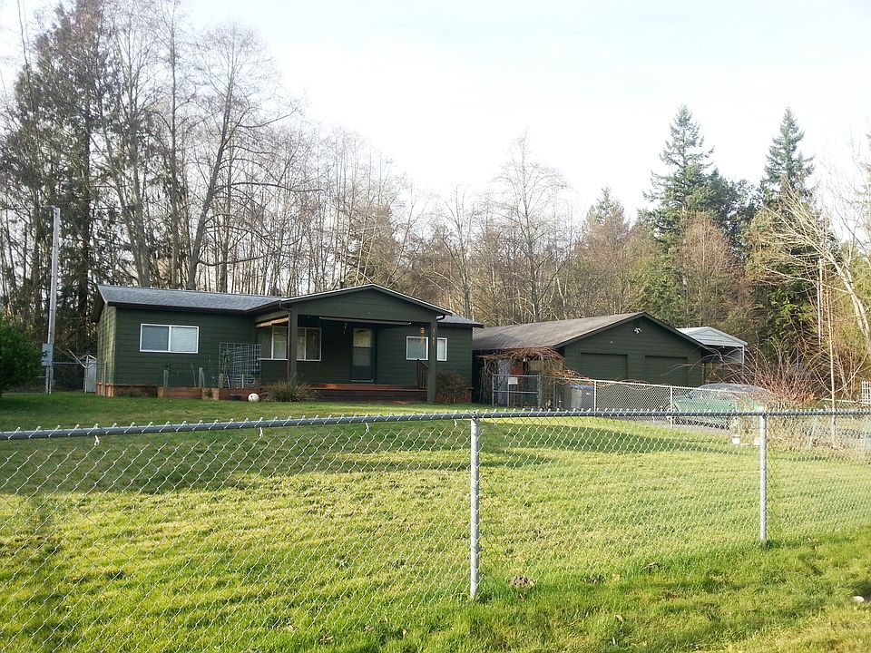 Home showing fenced portion of the property
