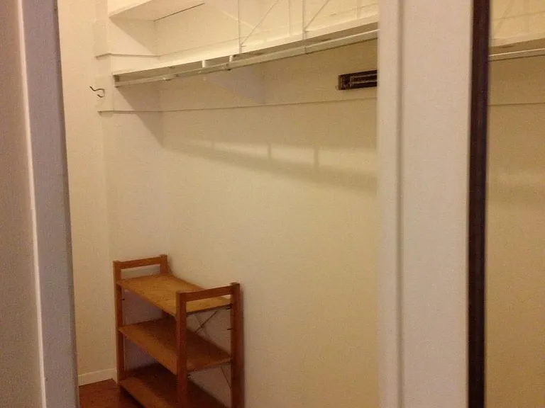 1 of two walk in closets. Only half off hanging space is sho
