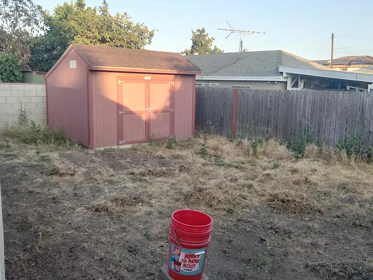Large yard. Improvements are currently being made and the owner is paying for the upkeep of the front and back yards