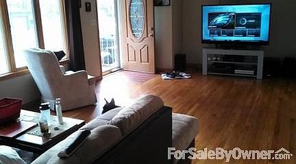 large windows with lots of natural light in kitchen and great room