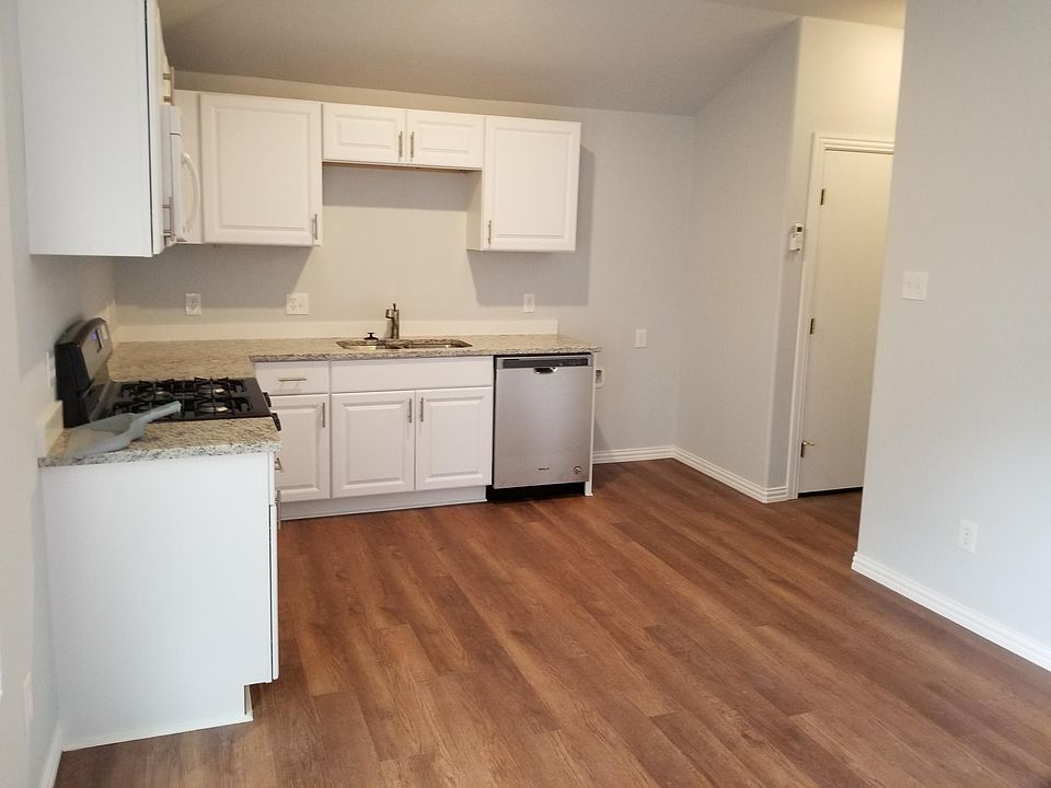 From entry looking towards Kitchen & laundry/hall