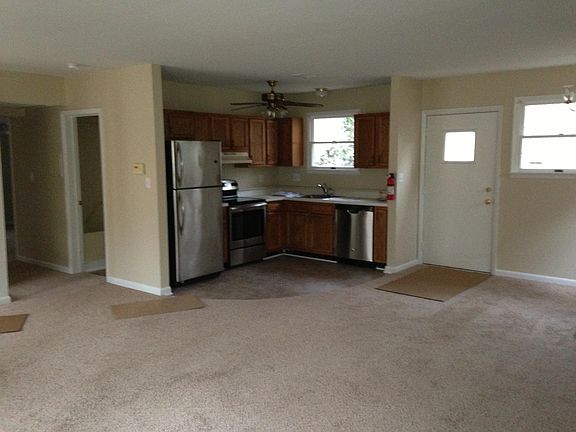 Kitchen with fridge, stove/oven, dishwasher. Ceiling fan. Breakfast area (not pictured).