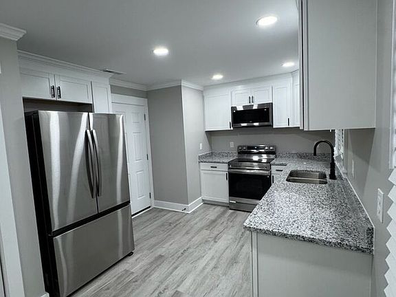 2nd image of 7001 Woodstream Dr #1