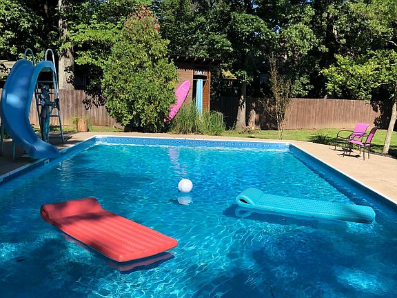 Lounge away in the large pool