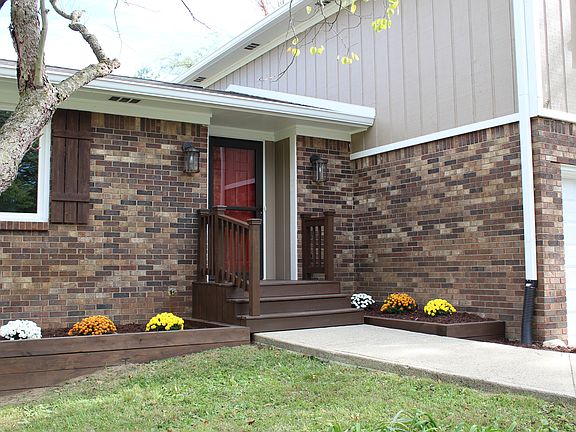 Stunning entry with porch!