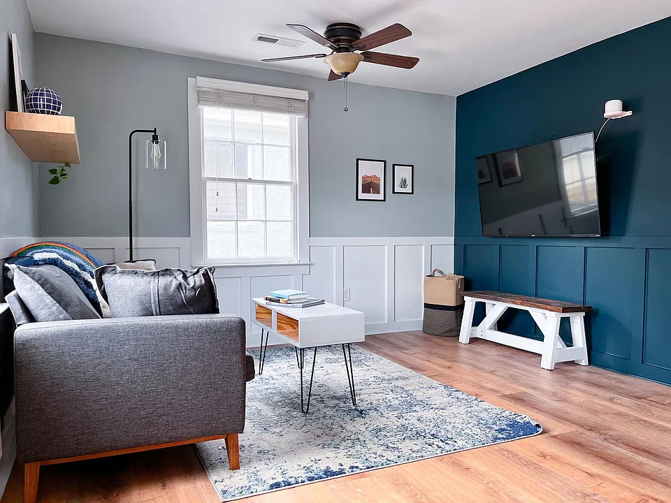 Open living space with smart layout and cozy seating area, ideal for relaxing or hosting a friend.
