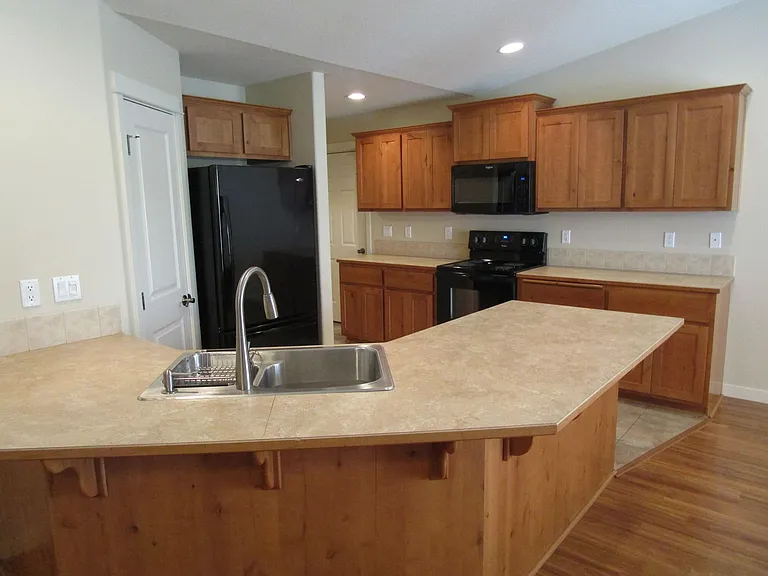 534 NE Brookstone Dr — Photo 16