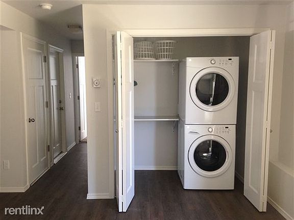 View from family room: laundry closet and hall to garage/3rd