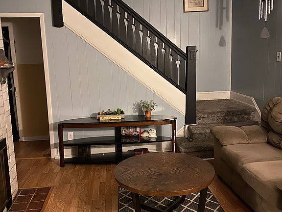 This is the front room it has dining room and small kitchen downstairs