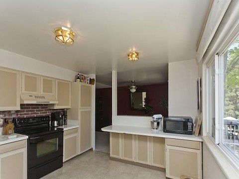 Kitchen Opens to Dining Room