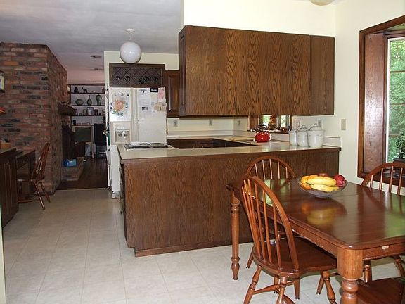 Kitchen Dining and glimpse of Family room