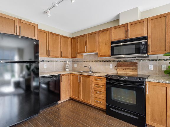 4th image of 1211 Village Green Way #504