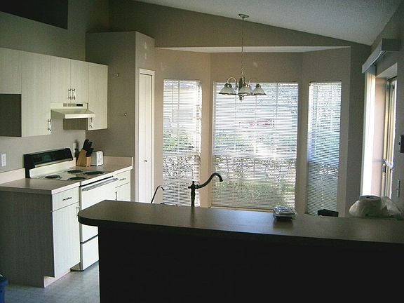 Kitchen with breakfast nook and bay window