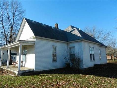 Metal siding and replacement windows. Even eaves are wrapped.