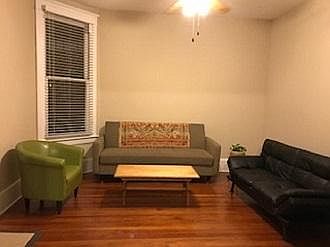 Entry room. Front door is in the bottom left-hand corner by the mat.