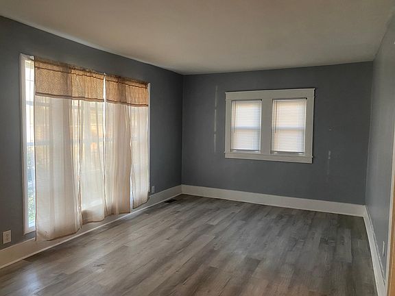 Front room with large windows lots of light